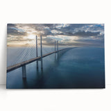 Stretched canvas wall art featuring a serene landscape of a bridge over a tranquil river, showcasing vibrant colors and natural scenery, perfect for home decor.