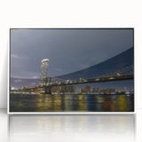 Framed acrylic wall art showcasing a serene landscape with a bridge, featuring vibrant colors and a sleek white frame, ideal for modern home decor.