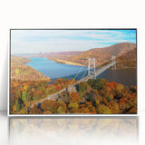 Framed acrylic wall art featuring a serene landscape with a bridge, showcasing vibrant colors and intricate details, perfect for home decor inspiration.