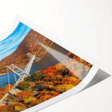 Scenic landscape wall art print showcasing a serene bridge over a tranquil river, featuring lush greenery and vibrant colors, ideal for home decor.