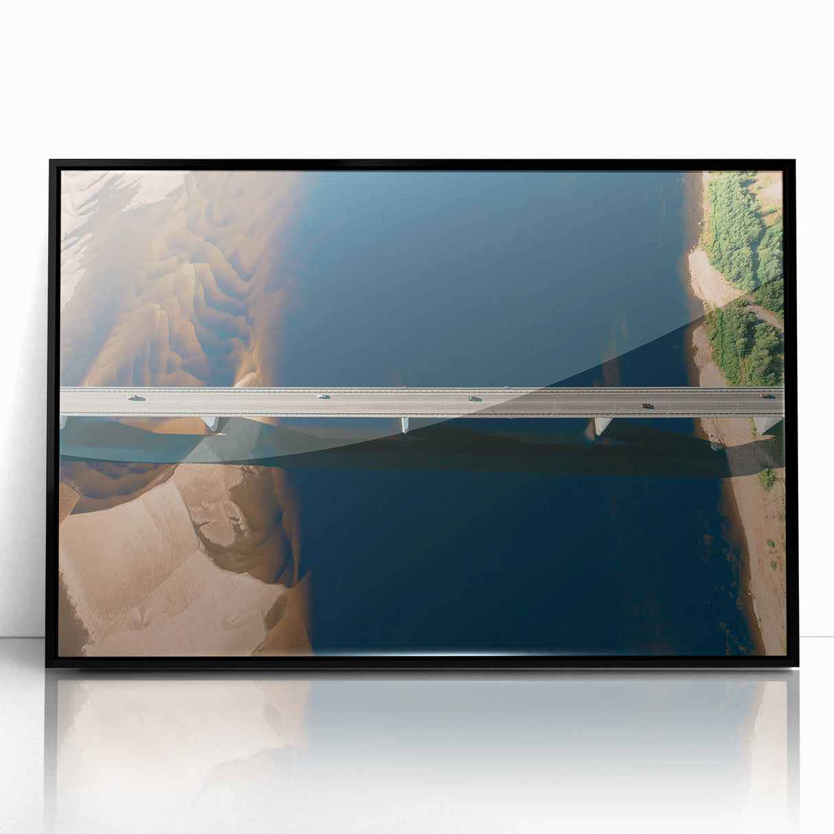 Framed acrylic wall art showcasing a modern bridge landscape design in black and white, perfect for contemporary home decor, enhancing any living space.