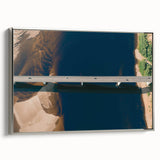 Framed canvas wall art showcasing a modern landscape bridge design, featuring a silver frame with a sleek side view, perfect for contemporary home decor.