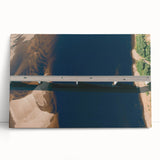 Stretched canvas artwork showcasing a serene landscape with a bridge, featuring vibrant colors and detailed textures, perfect for home decor.