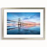 Framed wall art collection showcasing a serene landscape with a bridge, featuring a sleek silver mat and frame, perfect for enhancing home decor.