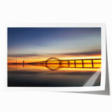 Colorful landscape wall art print showcasing a serene bridge scene surrounded by lush greenery, rolled for easy transport and display. Ideal for home decoration.