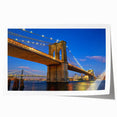 Vibrant rolled print of a serene landscape featuring a picturesque bridge over a tranquil body of water, perfect for home decor and art enthusiasts.