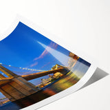 Rolled print of a modern landscape featuring a serene bridge over water, showcasing vibrant colors and intricate details, perfect for home decor.