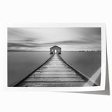 Rolled print of a stunning landscape featuring a serene bridge over a calm river, showcasing vibrant colors and intricate details, perfect for home decor.