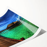 Rolled print showcasing a vibrant landscape bridge design in earthy tones, ideal for home decor. Packaged securely in a protective tube for easy transport.