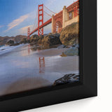 Close-up of a framed canvas artwork depicting a serene landscape with a bridge, showcasing vibrant colors and intricate details, perfect for home decor.