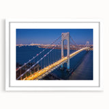 Framed wall art featuring a serene landscape design with a bridge and natural scenery, presented in a white mat and frame, perfect for home decor.