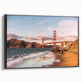 Framed canvas wall art showcasing a stunning landscape featuring a bridge at sunset, with rich colors of orange and blue, perfect for enhancing home decor.