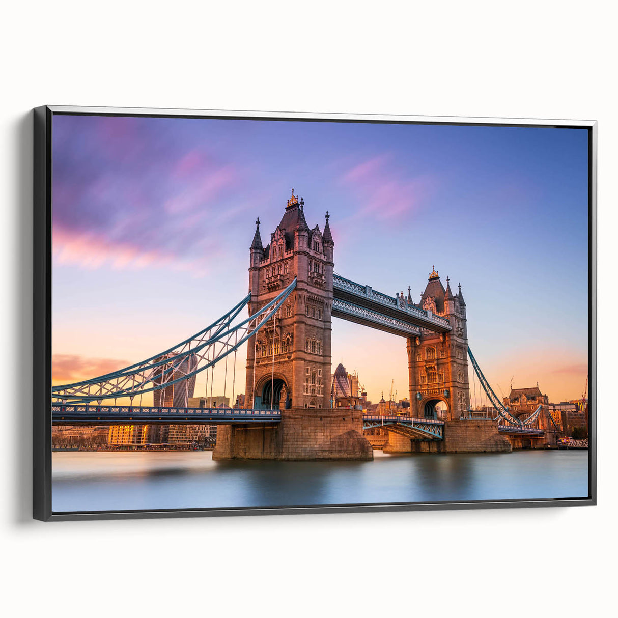 Framed wall art of a serene landscape featuring a bridge over a tranquil river, presented in a sleek black frame, ideal for modern home decor. The artwork captures vibrant colors and detailed scenery, enhancing any interior space with an elegant touch.
