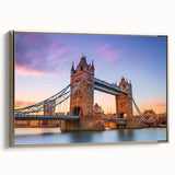 Framed canvas wall art featuring a scenic landscape with a bridge, accented in gold, designed for home decor. Ideal for enhancing living spaces with elegance.