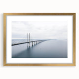 Elegant gold-framed wall art featuring a serene landscape bridge design, highlighted with a mat, perfect for enhancing home décor and creating a calming atmosphere.