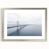 Silver-framed wall art featuring a stunning landscape design of a bridge, elegantly matted for a sophisticated finish, perfect for home decor accents.