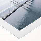 Rolled canvas artwork showcasing a vibrant landscape featuring a serene bridge over a tranquil river, perfect for home decor. The piece emphasizes natural beauty and harmony.