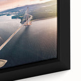 Close-up of a beautifully framed canvas print showcasing a vibrant landscape bridge design, featuring rich colors and intricate details, perfect for home decor.