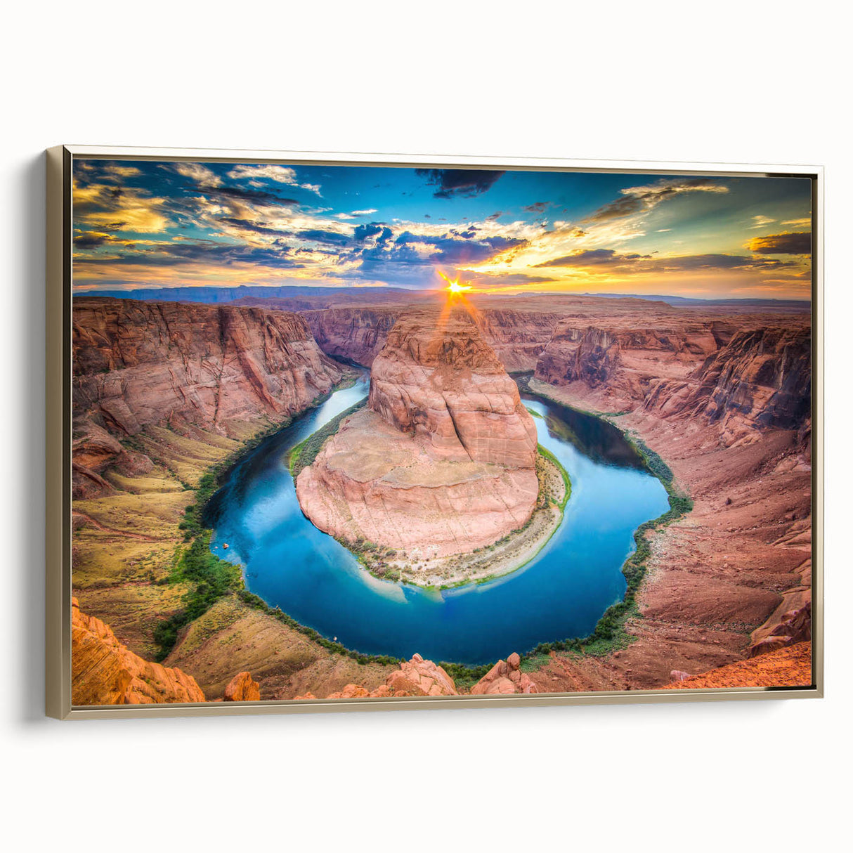 Framed canvas wall art depicting a stunning canyon landscape, featuring rich earthy tones and a gold frame, perfect for enhancing modern home decor.