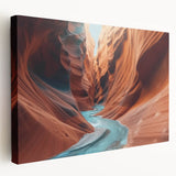 Stretched canvas wall art showcasing a stunning canyon landscape design, featuring vibrant orange and blue hues, perfect for home decor or office spaces.