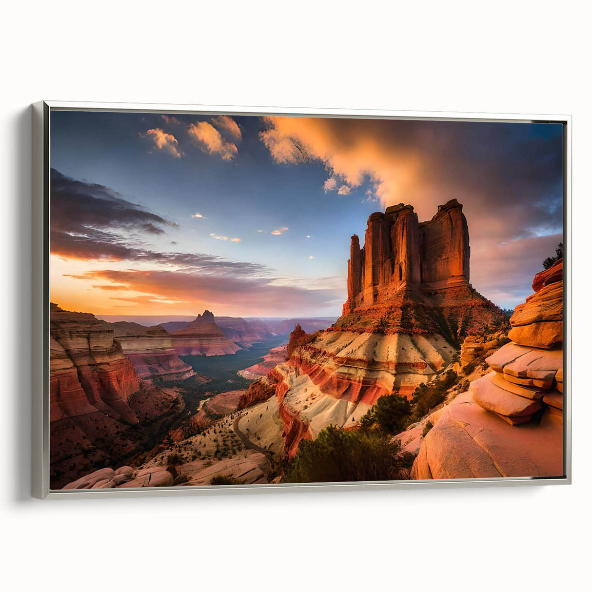 Framed wall art of a vibrant canyon landscape featuring rich earthy tones and dramatic rock formations, beautifully showcased in a sleek silver frame, ideal for home decor.