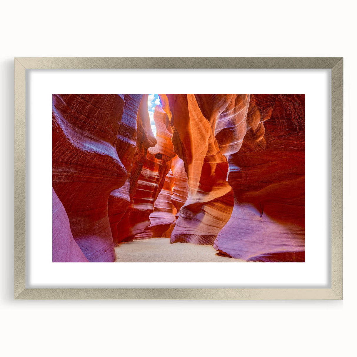 Framed wall art collection featuring a stunning canyon landscape design, elegantly presented with a silver frame and mat, ideal for enhancing home decor.