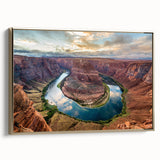 Framed canvas wall art depicting a stunning canyon landscape with rich gold tones, perfect for home decor. Side view shows elegant framing and texture.