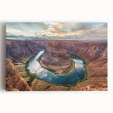 Stretched canvas wall art showcasing a vibrant canyon landscape in warm hues, designed to enhance modern decor with its stunning natural scenery and depth.