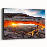 Framed canvas wall art showcasing a stunning canyon landscape design in rich earth tones, featuring a sleek black frame, ideal for enhancing modern decor.