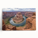 Stretched canvas artwork showcasing a vibrant canyon landscape with rich earthy tones, perfect for adding natural beauty to home decor. Ideal for nature enthusiasts and art lovers.