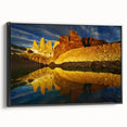 Framed canvas wall art showcasing a stunning canyon landscape design in rich earthy tones, with a sleek black frame for an elegant side view display. This piece adds a touch of nature-inspired decor to any room.