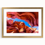 Framed wall art collection showcasing a stunning canyon landscape design with a gold mat, ideal for home decor. This piece adds elegance and depth to any room.