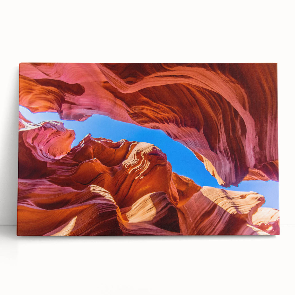 Stretched canvas wall art displaying a vibrant canyon landscape design, featuring rich earthy tones and intricate details, ideal for home decor enhancement.