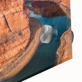 Close-up of a vibrant acrylic glass wall art piece showcasing a stunning canyon landscape design, featuring rich colors and intricate details, perfect for home decor.