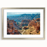 Framed landscape wall art collection showcasing vibrant canyon designs in silver matting. Ideal for home decor, this piece adds a touch of nature-inspired elegance.