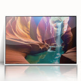 Framed acrylic wall art showcasing a stunning canyon landscape design with vibrant colors, elegantly displayed with a white frame, perfect for home decor.