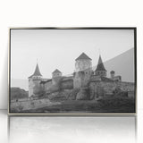 Framed acrylic wall art showcasing a stunning landscape with a majestic castle, featuring a silver frame that enhances the artwork's elegance, ideal for home decor.