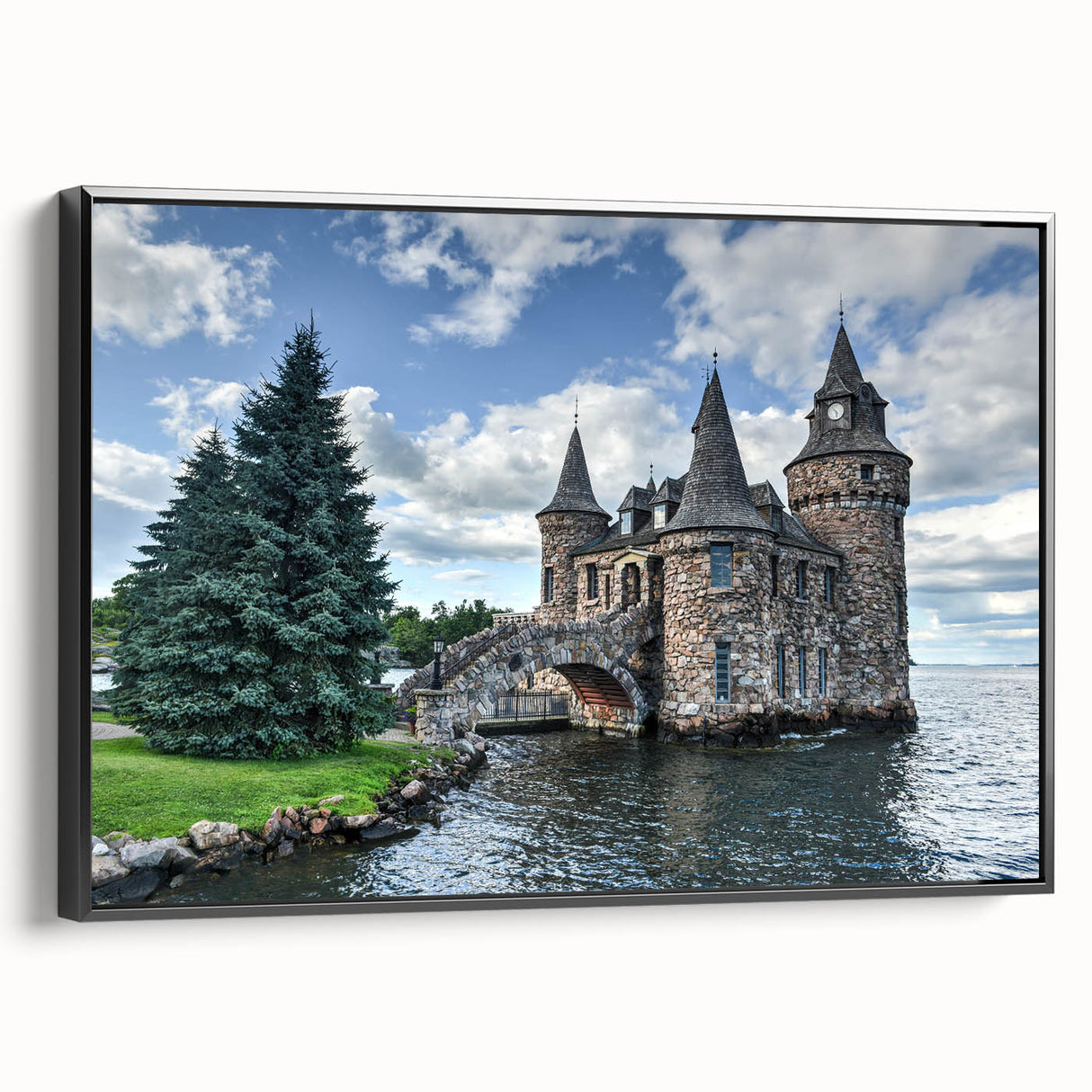 Framed canvas wall art showcasing a stunning landscape with a historic castle, featuring a black frame and side view, perfect for home decor and enhancing interior aesthetics.