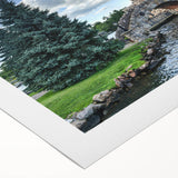 Rolled canvas art showcasing a vibrant landscape of a majestic castle surrounded by lush greenery, ideal for home decor enthusiasts seeking elegant wall art.