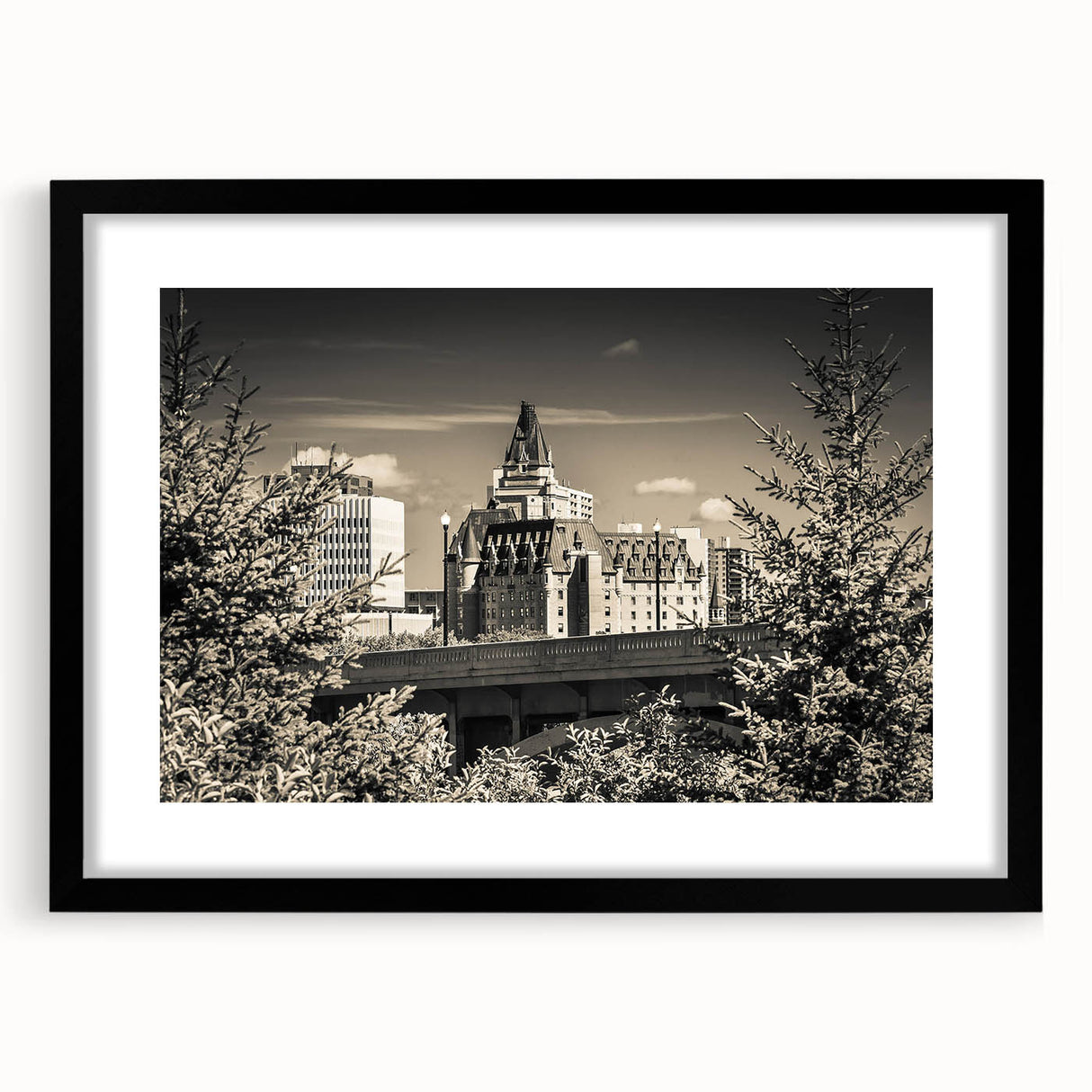 Framed black wall art featuring a serene castle landscape design with a white mat, ideal for home decor, evoking elegance and tranquility in any setting.
