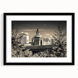 Framed black wall art featuring a serene castle landscape design with a white mat, ideal for home decor, evoking elegance and tranquility in any setting.