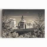 Stretched canvas artwork depicting a vibrant landscape of a historic castle surrounded by lush greenery, perfect for home decor, emphasizing rich colors and intricate details.
