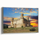 Framed canvas wall art showcasing a serene landscape with a majestic castle, elegantly bordered in silver, perfect for enhancing home decor.