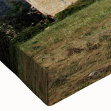 Close-up of a stretched canvas wall art piece depicting a majestic castle landscape, showcasing intricate details and vibrant colors, ideal for home decor.