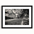 Framed black wall art showcasing a detailed landscape of a majestic castle, complete with a mat for added elegance, ideal for home decor and enhancing interior aesthetics.