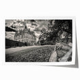 Vibrant rolled print showcasing a detailed landscape castle design, featuring lush greenery and a clear blue sky, ideal for home decor and art enthusiasts.