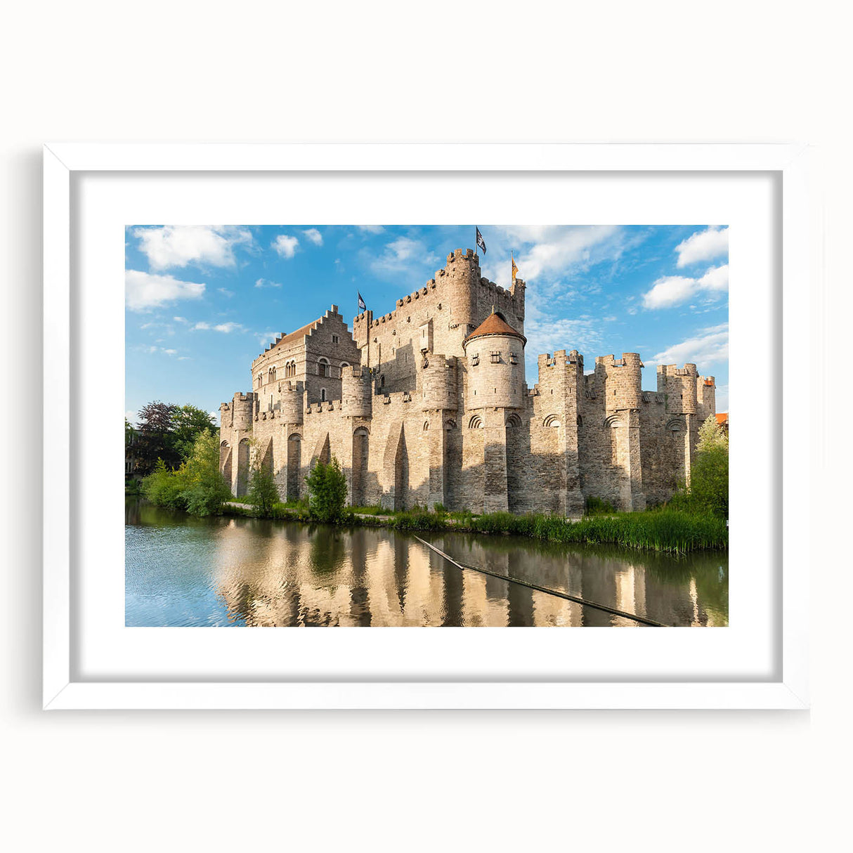 Framed wall art showcasing a stunning landscape castle design, featuring a white mat and sleek frame, perfect for enhancing home decor.