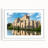 Framed wall art showcasing a stunning landscape castle design, featuring a white mat and sleek frame, perfect for enhancing home decor.