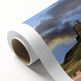 Vibrant rolled canvas showcasing a picturesque landscape featuring a majestic castle surrounded by lush greenery, ideal for home decor and wall art enthusiasts.