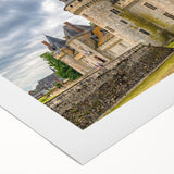 Rolled canvas artwork showcasing a vibrant landscape featuring a majestic castle surrounded by lush greenery, perfect for home decor enthusiasts.